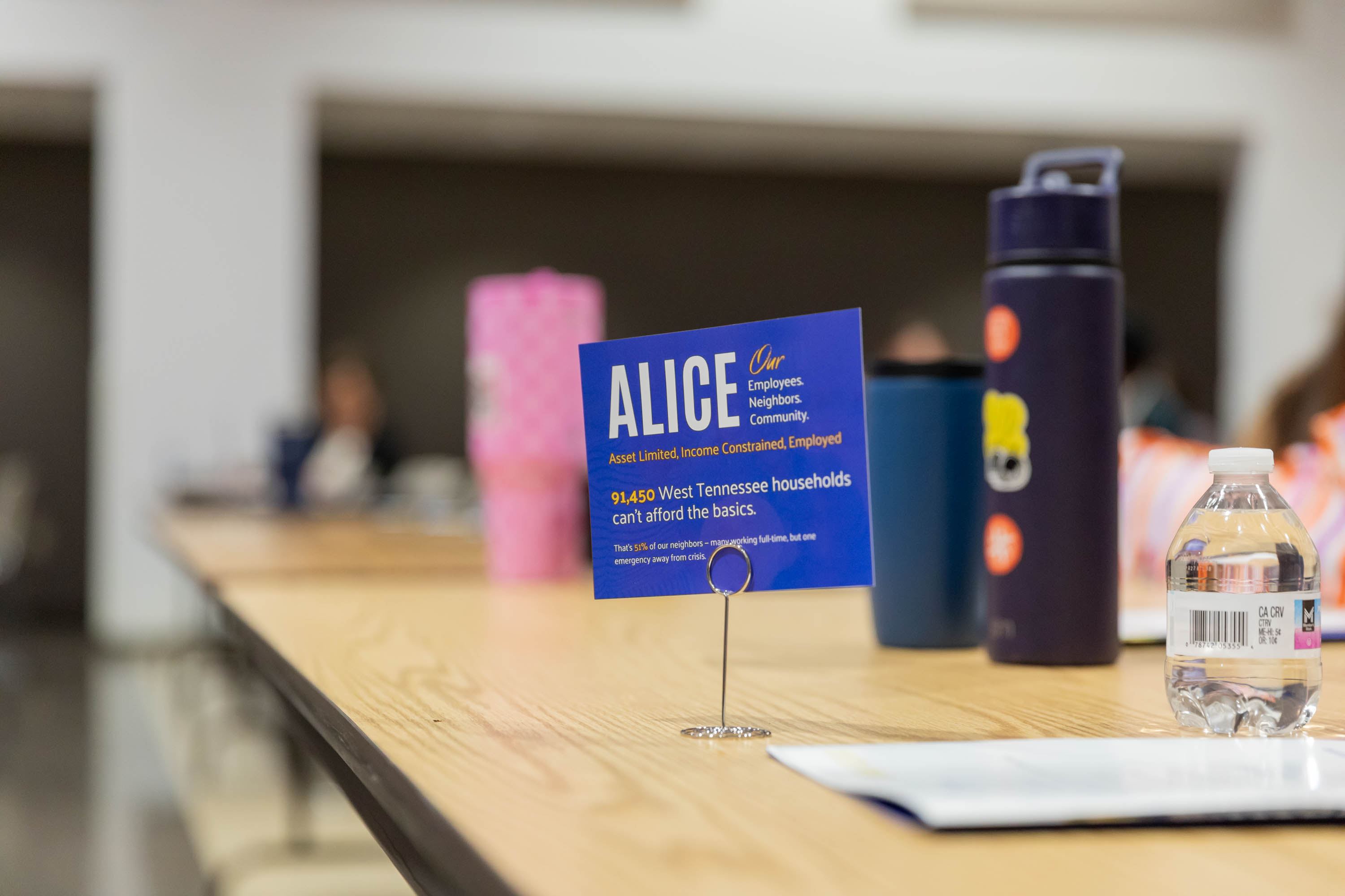 A photo of a table topper with impact stats