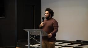 student leading a meeting