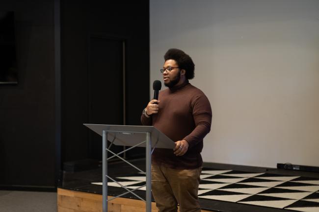 student leading a meeting